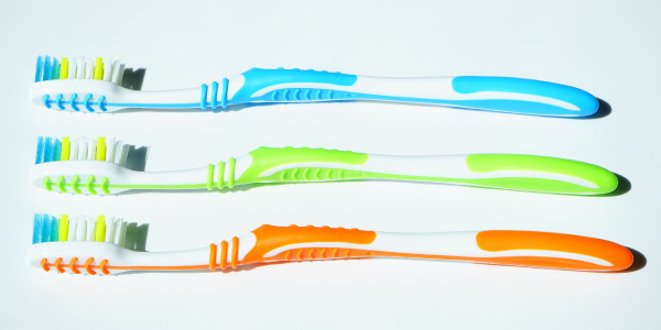 three toothbrushes